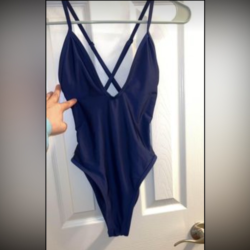 Brand new Hoaka. Size XS. Only worn to try on.